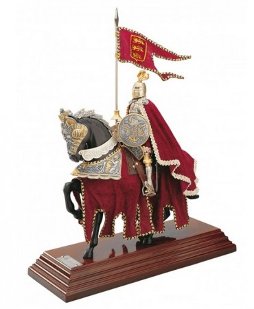 Miniatura artigianale di un cavaliere a cavallo con un mantello rosso