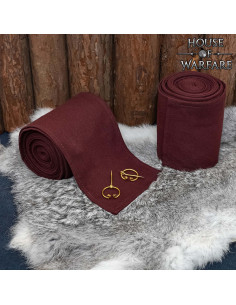 Middeleeuwse Winingas van bruin katoen met bronzen fibula's