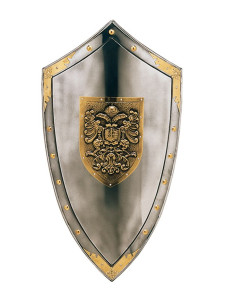 Schild mit goldener Gravur von Adlern und Nieten rundherum