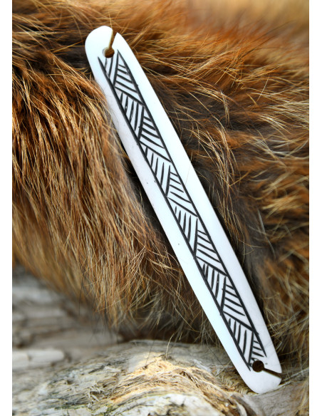 Lanzadera medieval de hueso para tejer